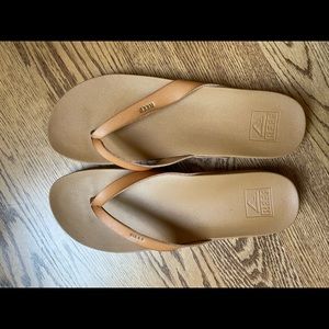 Reef tan flip flops